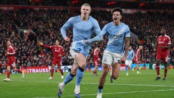 Late drama sees Man City keep title race alive with win at Liverpool