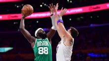 Neemias Queta dunks over Luka Doncic in Celtics-Lakers