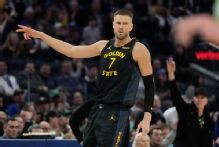 Kristaps Porzingis leaves Warriors' loss with lower back spasms