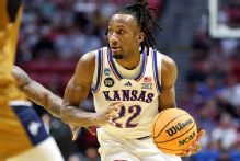 Peterson scores 28 in NCAA tournament debut as Kansas holds on