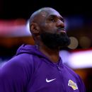 LeBron James Shatters Backboard in Epic Driveway Showdown with Bronny