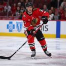 Blackhawks' Nazar wears cage after losing 2 teeth