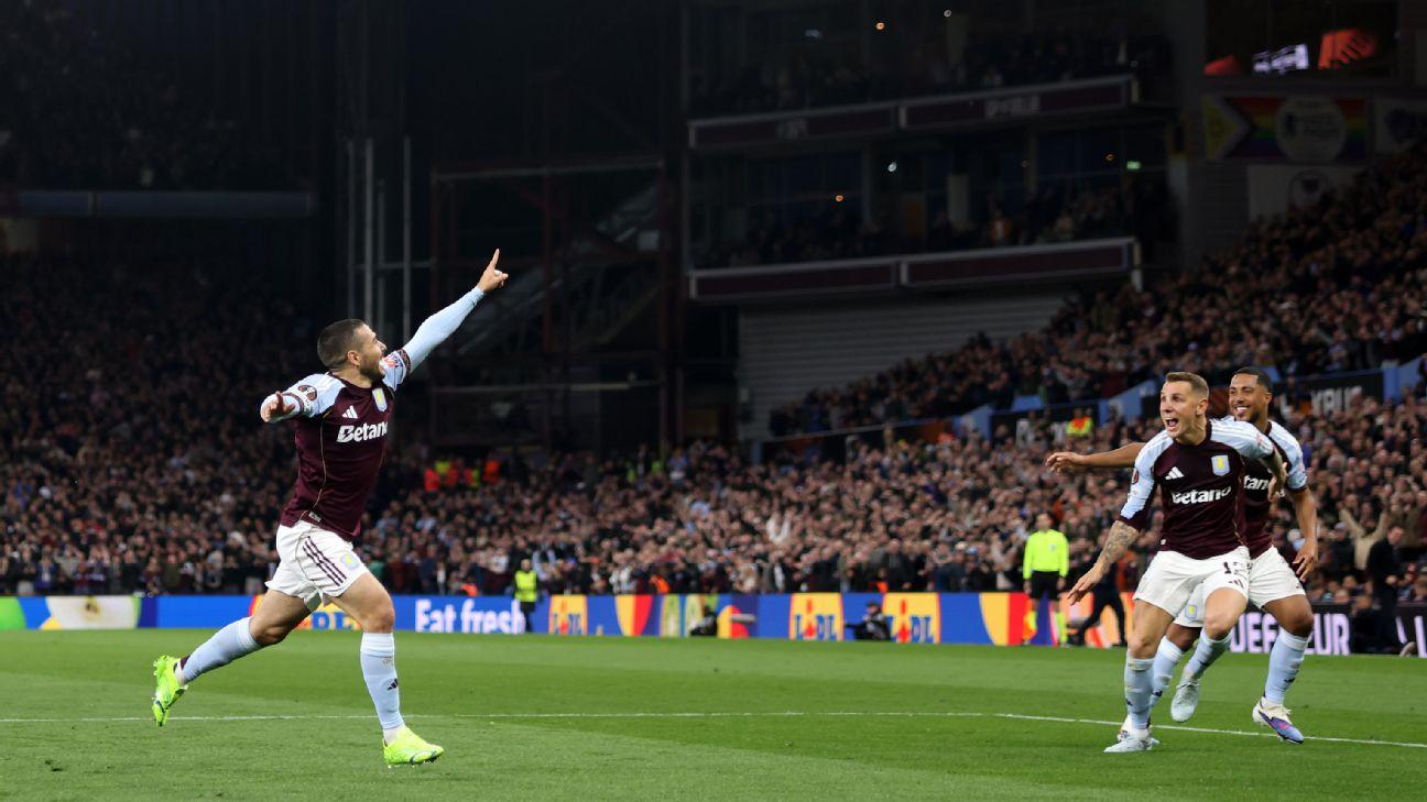 Aston Villa players celebrate after scoring a goal against Bologna in the Europa League.