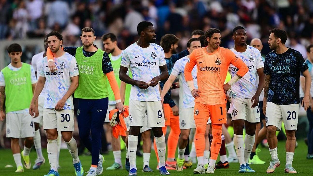 Inter Milan players salute the travelling supporters after a draw away to Torino in Serie A.