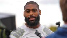 Broncos' Cooper pleads not guilty; trial set for late July