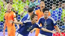 Japan fight back twice to snatch late draw vs. Netherlands