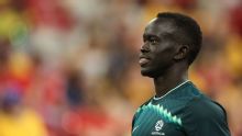 Socceroos star Mabil sends message to refugees: 'We are with you'