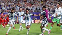 Argentina survive Switzerland to book semifinal with England