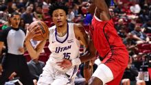 Alexander, del Jazz, retirado en camilla en juego Liga de Verano