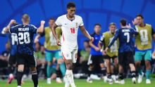 England midfielder Bellingham slaps Argentina's Barco on the head after World Cup semifinal exit