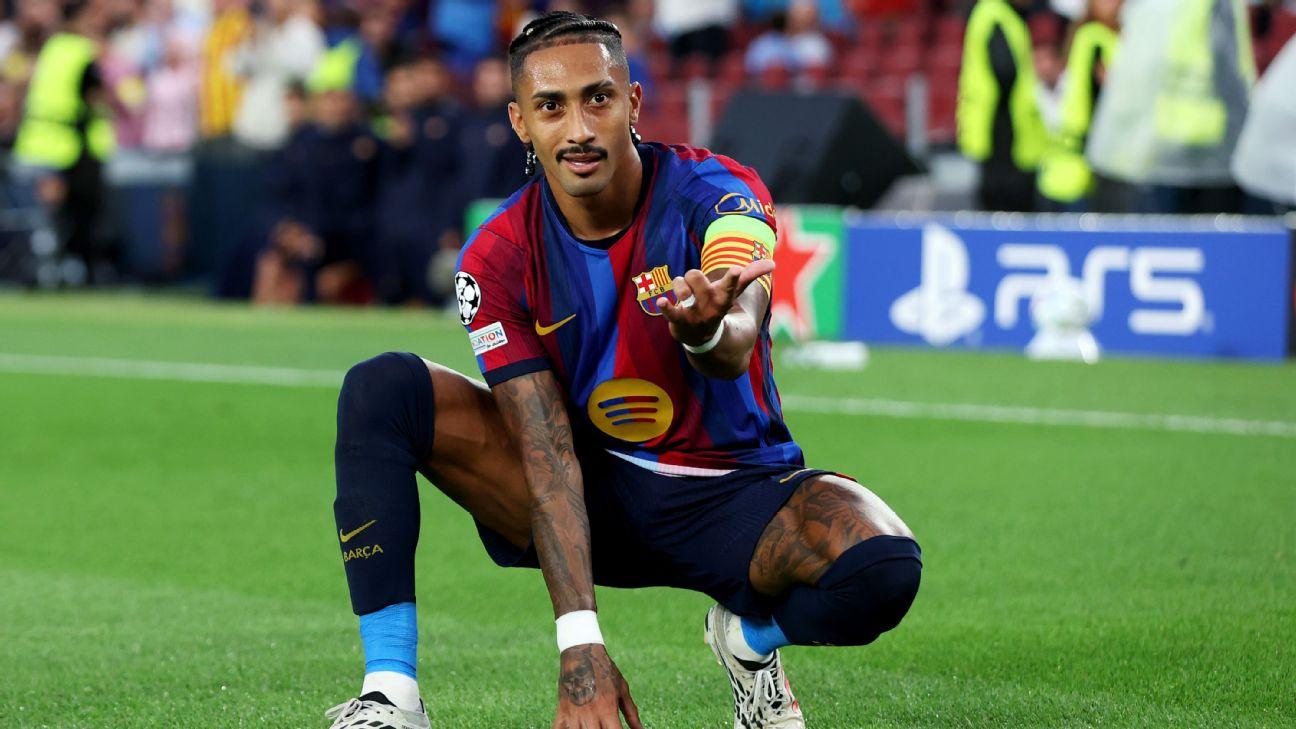 Raphinha celebrates after scoring his second goal in Barcelona's win over Feyenoord.