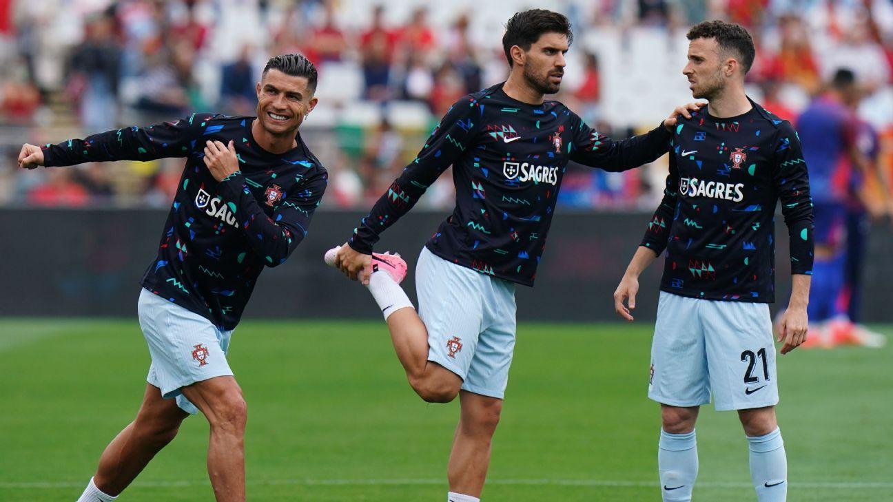 Cristiano Ronaldo (left) and Rúben Neves (centre) played for Portugal alongside Diogo Jota (right).