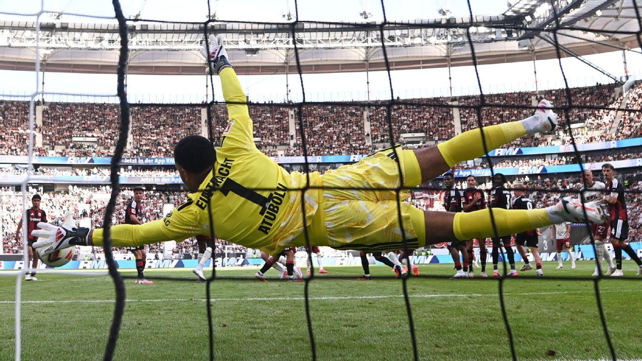 Germany youth international Noah Atubolu at full stretch to make the save for Frankfurt.