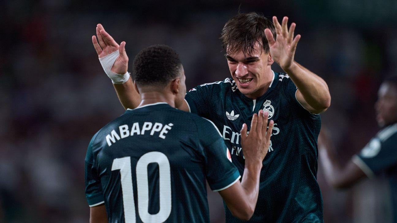 Real Madrid players celebrate after scoring the game-winning goal against Elche in LaLiga.