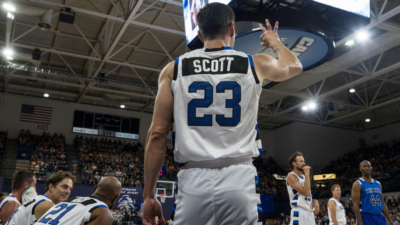 Actor James Lafferty (23) signals to his teammates during a basketball game hosted by Friends With Benefit commemorating the 23rd anniversary of One Tree Hill at the UNCW's Trask Coliseum on Sept. 19.