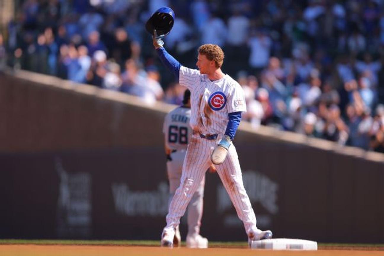 Cubs star Pete Crow-Armstrong acknowledges fans after becoming just the seventh player in major league history to hit 40 home runs and steal 40 bases in the same season.