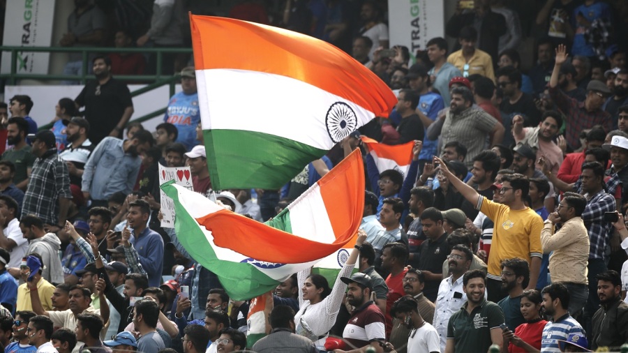 India fans wave the flag — Article image accompanying Om five-for bowls Australia Under-19 out for 217 despite Cattle century on WagerUp Sports News. India fans wave the flag — Article image accompanying Om five-for bowls Australia Under-19 out for 217 despite Cattle century on WagerUp Sports News.