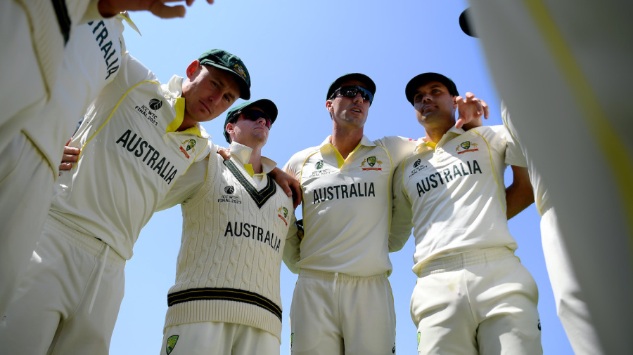 Pat Cummins talks in the huddle involving Marnus Labuschagne, Steven Smith, and Alex Carey — Article image accompanying Good old Australia push for greatness in twilight year on WagerUp Sports News.