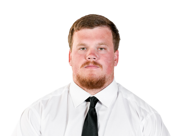 Headshot of Justin Brett