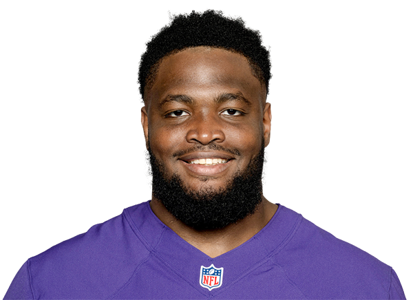 Baltimore Ravens defensive tackle Justin Madubuike (92) gets to