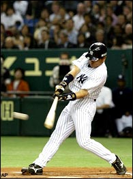 Tampa Bay Devil Rays' Tino Martinez, left, gets a high-five from