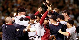 Baseball In Pics - Johnny Damon and Damian Jackson collide attempting to  catch a ball in the outfield, 2003