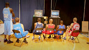 The rookies play video games during the photo shoot.