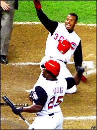 Cincinnati Reds' Ken Griffey Jr. celebrates with teammates Sean