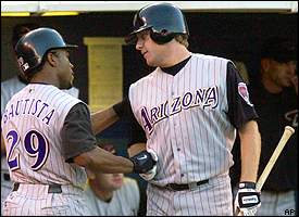 Arizona Diamondbacks starter Curt Schilling, right, is