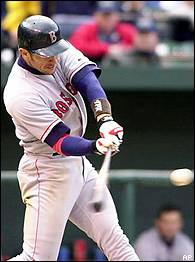 Boston Red Sox's Johnny Damon scores on a sacrifice fly by Manny