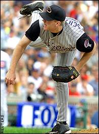 Arizona Diamondbacks starter Curt Schilling, right, is