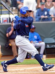 Marlins outfielder Juan Pierre bunting for a hit.