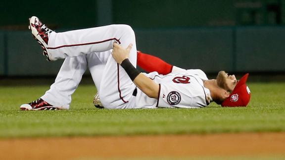 Bryce Harper leaves game with apparent left knee injury