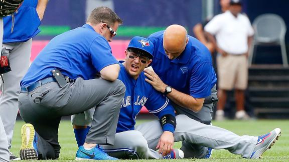 Blue Jays shortstop Troy Tulowitzki cracks left shoulder blade