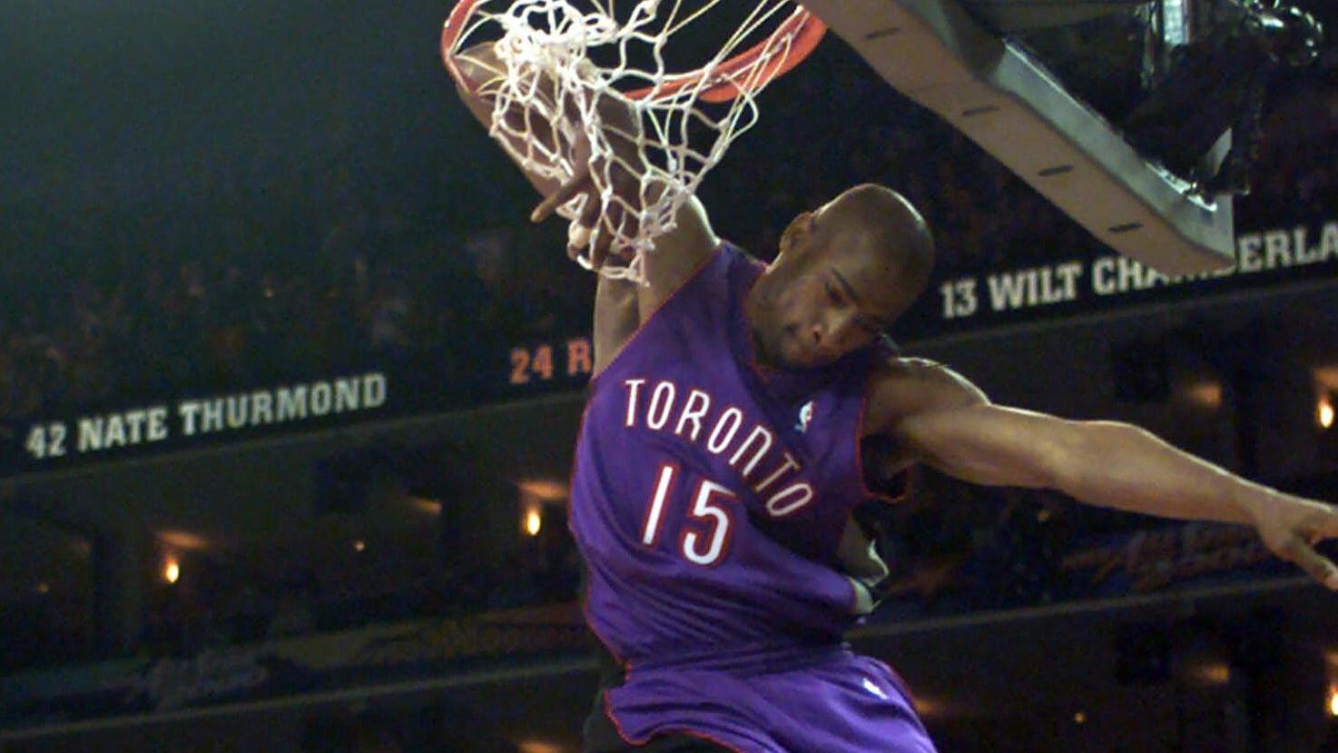 Vince Carter of the Toronto Raptors goes for a dunk during the 2000