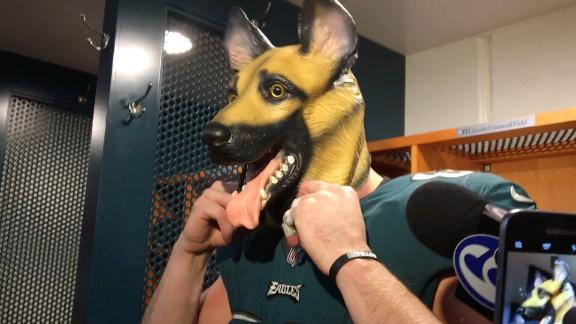 Lane Johnson and Chris Long put on dog masks after the Eagles beat