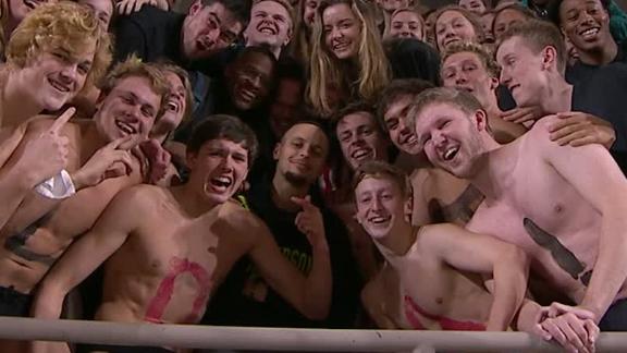 Curry celebrates in student section after Davidson's win