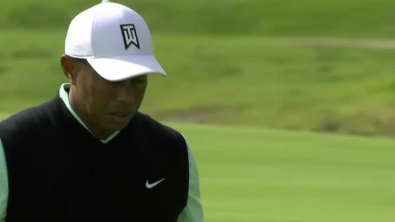Tiger gets birdie after poor approach