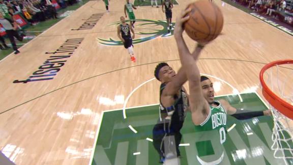 Giannis pins Tatum's breakaway jam