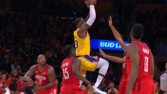 LeBron explodes to rim for Statue of Liberty slam