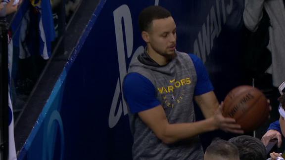 Curry hits tunnel shot before game