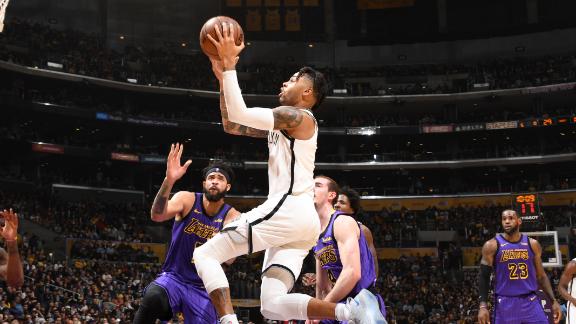 Russell's double-double helps end Lakers' playoff hopes