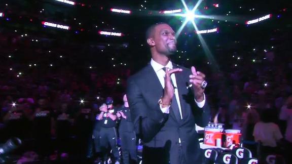 Bosh honored by Heat retiring his jersey