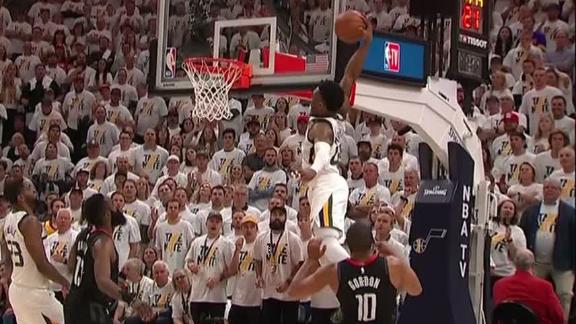 Mitchell reaches back for alley-oop dunk