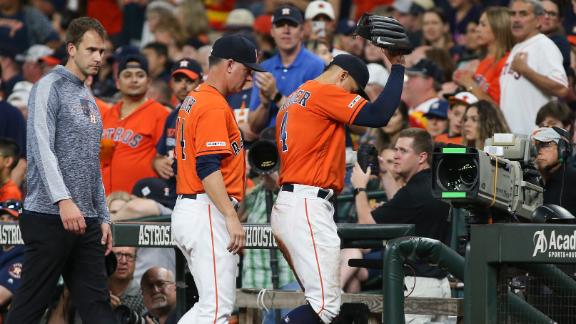 Springer exits in the 8th with injury