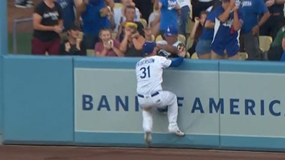 Pederson smashes two homers, exits game after making great catch