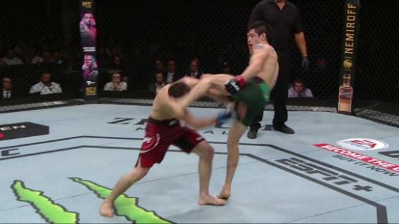Moreno catches Askarov with head kick