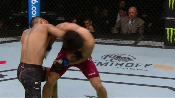 Quinonez drops Huachin with right hand