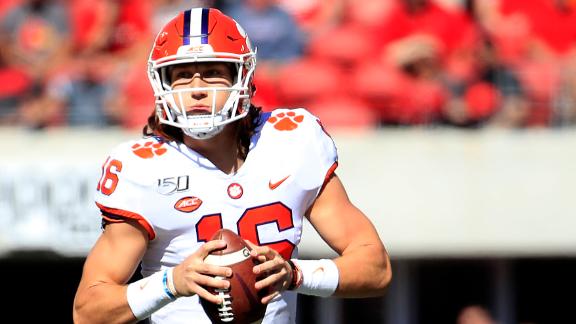 Lawrence recovers from 2 INTs to lead Clemson to win