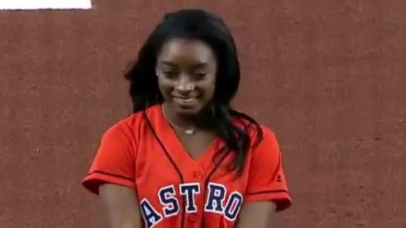 Biles does backflip before throwing out first pitch